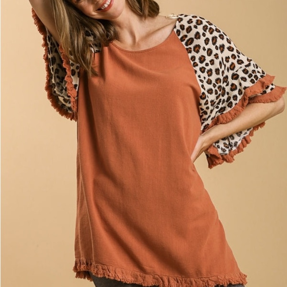 Umgee shirt pretty rust color with pattern on sleeves size 1x